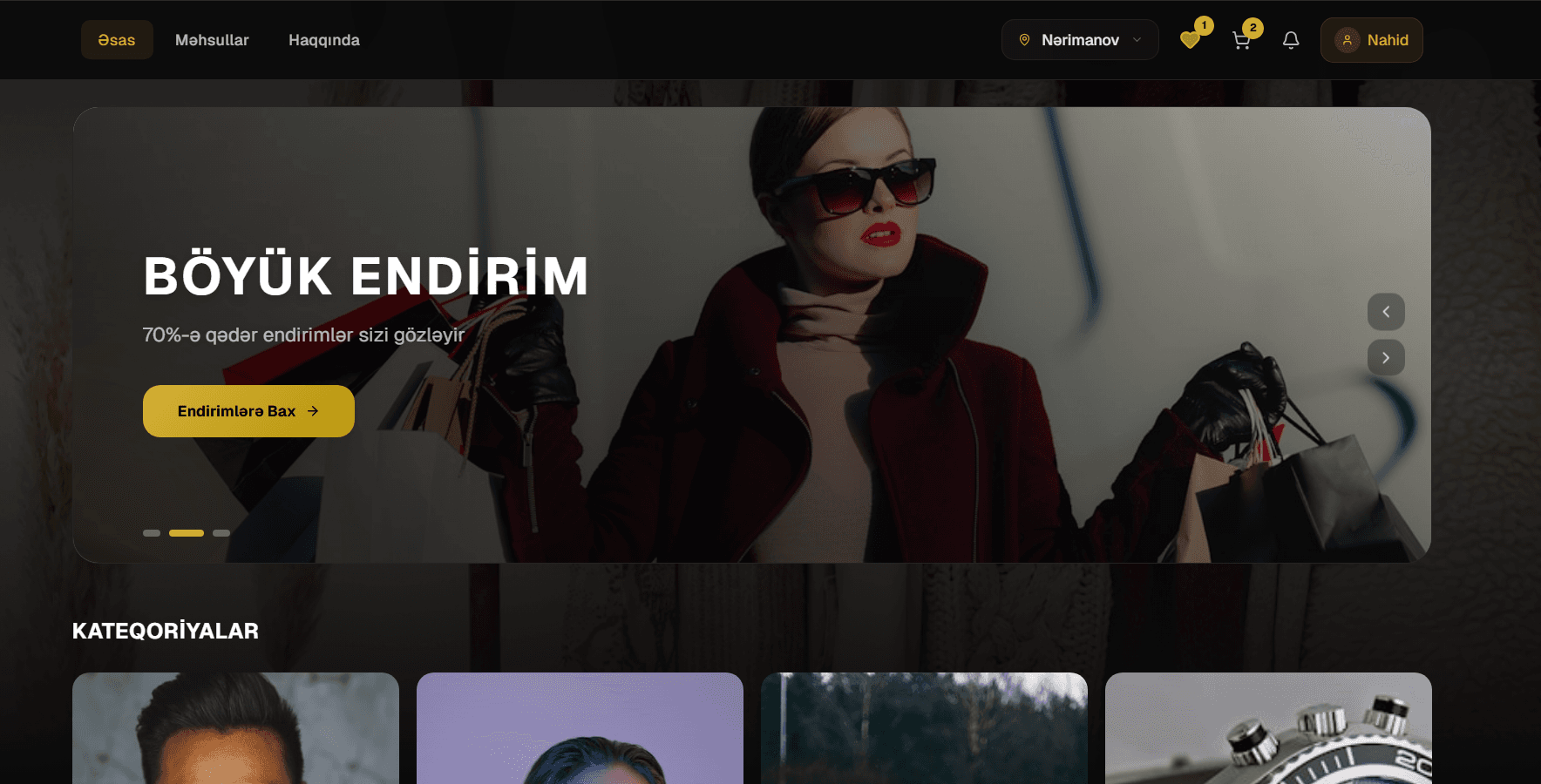 Brend Ucuzluq e-ticarət saytının hero ekranı — 'Böyük endirim' başlığı və qırmızı palto geymiş redaksiya tonlu model